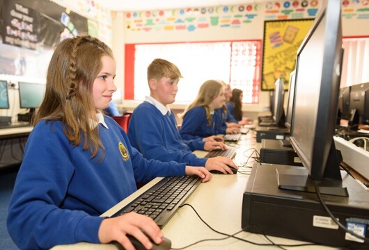 Cwmtawe pupils working on computers